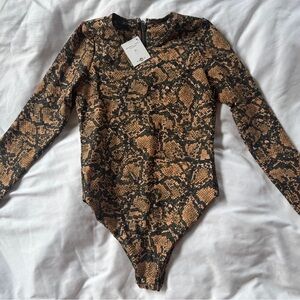 Skatie Tan and Black Snake Print One Piece